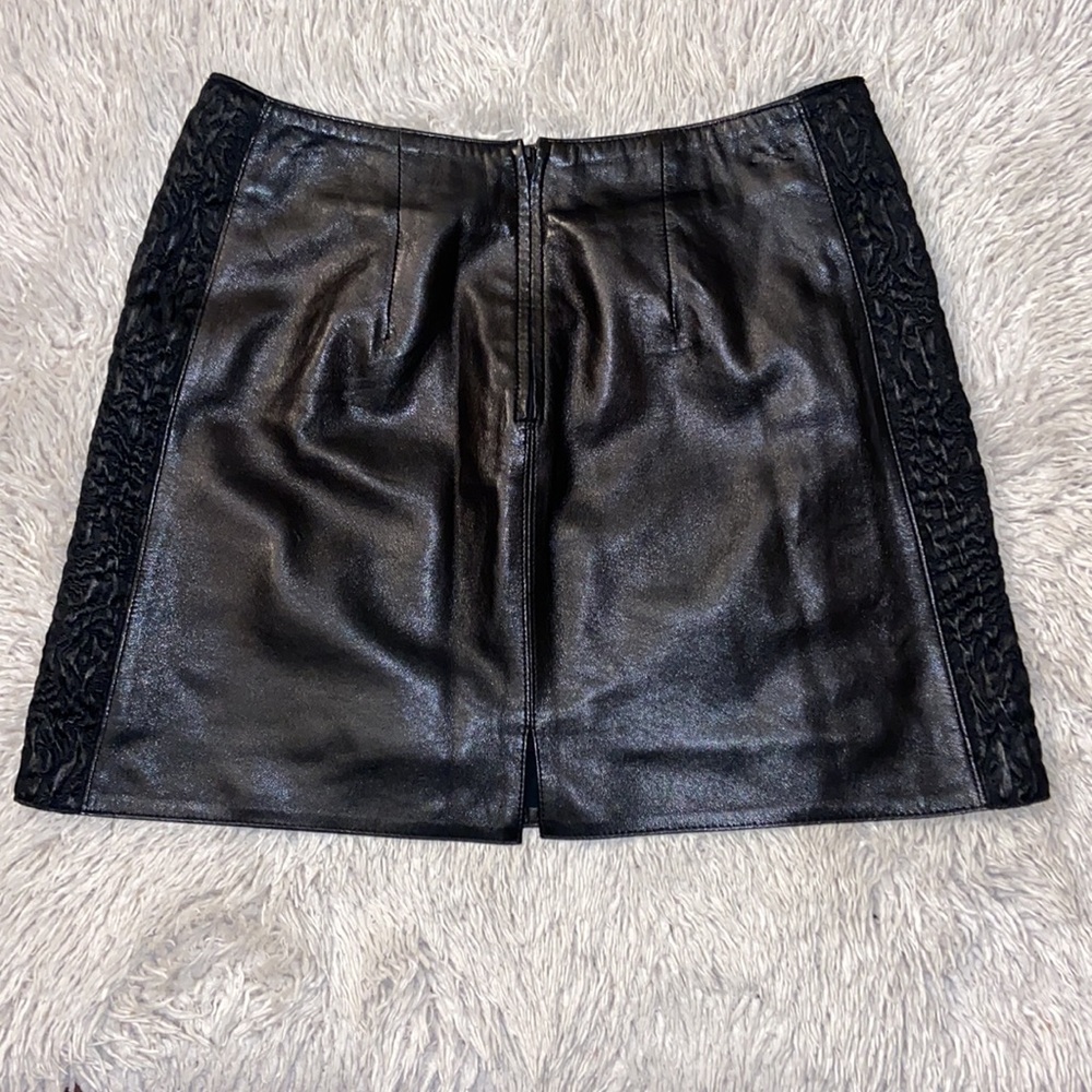 Black leather mini skirt